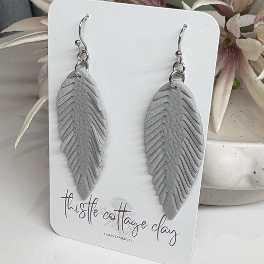 Leather Effect Earrings | Feathers